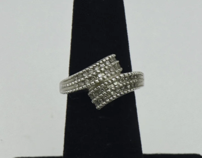 Rings with infinity loops for timeless love -Vintage Diamonds Sterling Silver Bypass Ring - Size 5