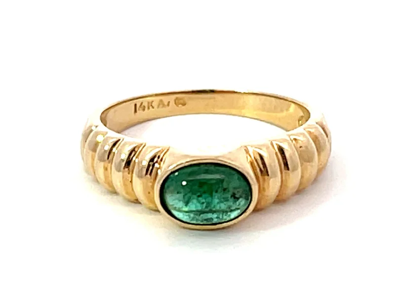 Rings with spiral designs for eye-catching twist -Oval Cabochon Green Emerald Ribbed Band Ring 14k Yellow Gold