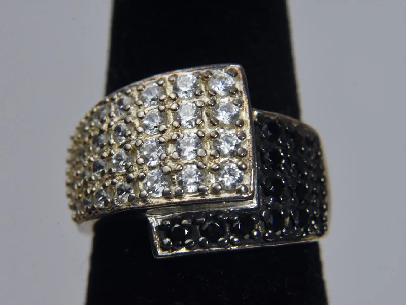 Rings with pave ruby for dazzling sparkle -Ross-Simons - Sterling Silver White and Black Crystal Bypass Ring - Size 6