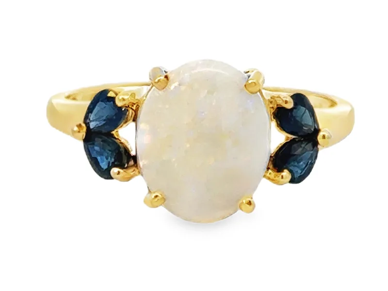 Rings with gothic-inspired skull motif details -Oval Cabochon Opal and Pear Shaped Sapphires Ring 14k Yellow Gold