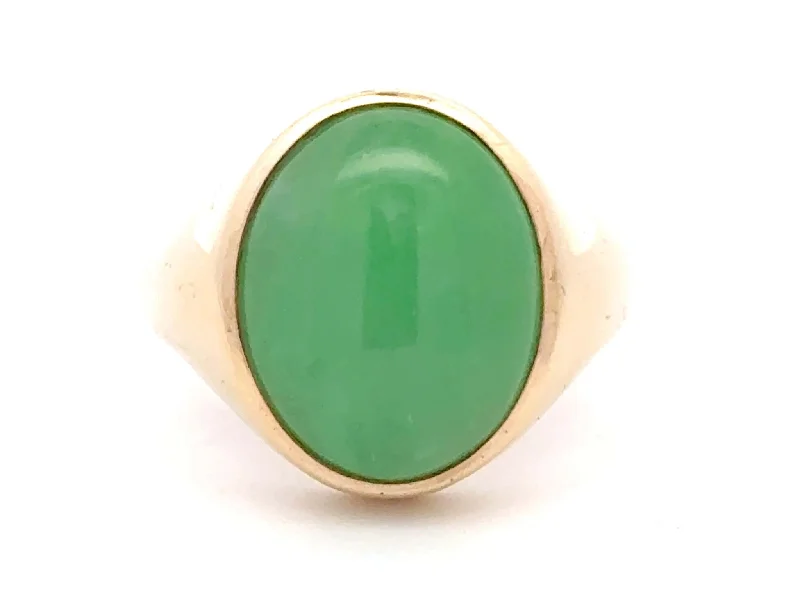 Rings with polished opal for iridescent beauty -Oval Cabochon Mottled Green Jade Ring 14K Yellow Gold