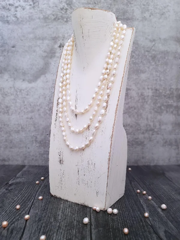 Best necklaces and pendants with intricate filigree for vintage-inspired elegance-Religious necklaces for spiritual gifts -Ivory Pearl Necklace - Semi Baroque Pearls