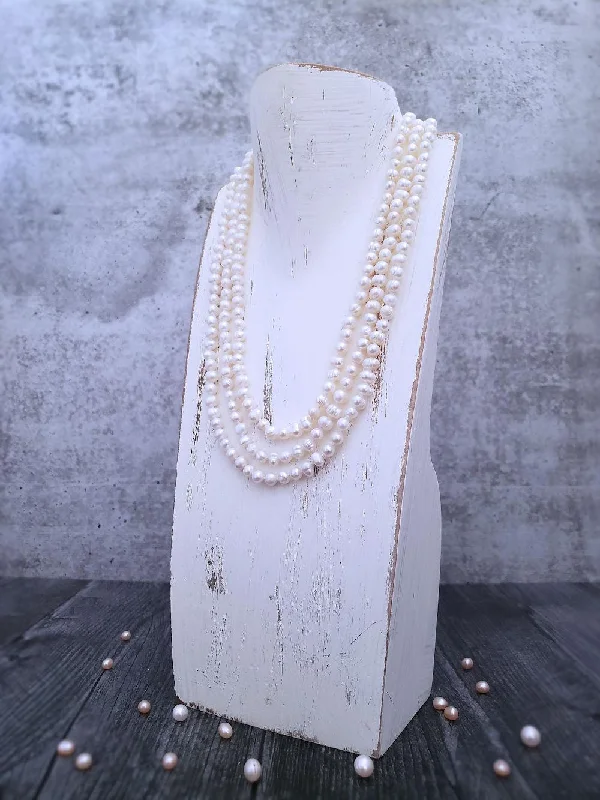 Trendy necklaces and pendants with statement pieces for a bold fashion statement-Colorful gemstone necklaces for casual style -Ivory Pearl Necklace - Infinity Style - Rounds